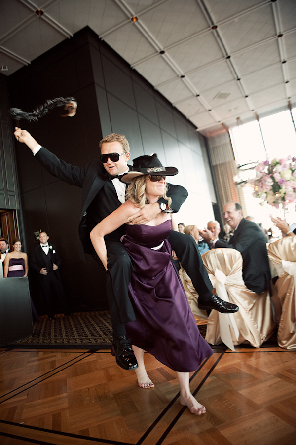 the-bride-carrying-her-groom-on-her-shoulders-photo-by-houston-based